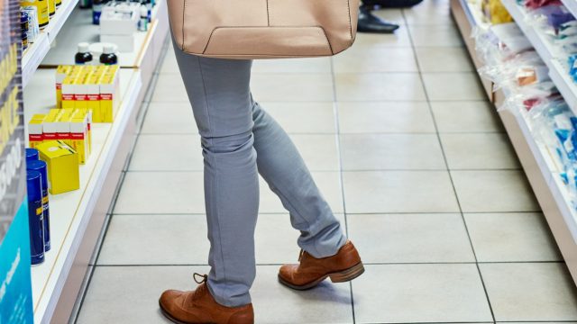Cropped shot of a female customer in a pharmacy